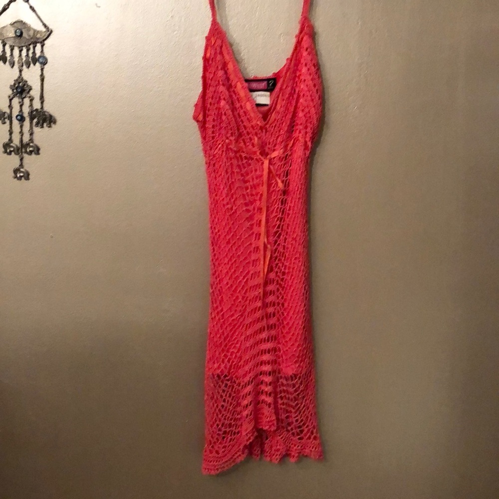 Coral spaghetti strap blouse.